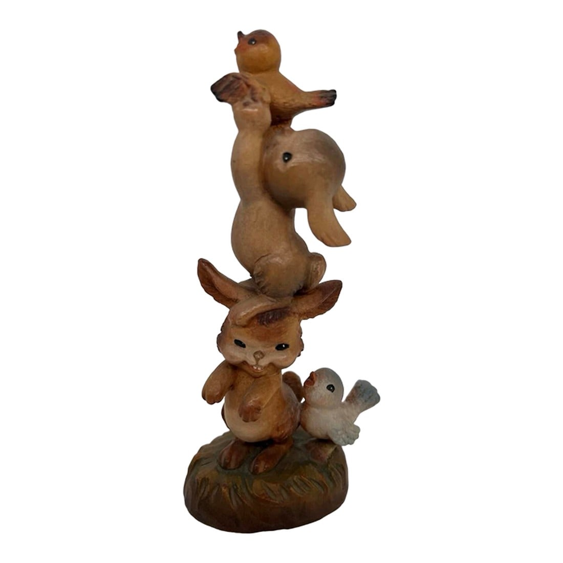 Vintage Jerrandiz Wooden Carved Figurine "Helping Hands": Very old hand carved Jerrandiz statue. Cute little rabbits helping the little birds fly! This is made of wood and is very early Jerrandiz studio carving. As you will see the top bird's wing has been b