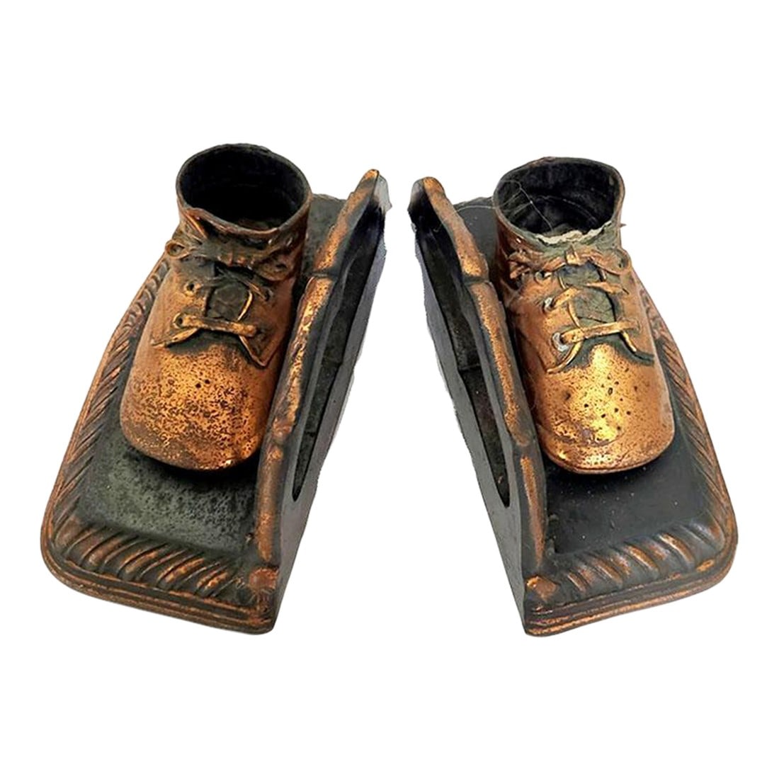 Mid Century Copper Bronzed Baby Shoe Bookends: Rare set of copper bronzed baby shoes that were up cycled to create bookends. These would make a great baby gift or nursery decorative item to display baby/children's books. Measurements: Each shoe me