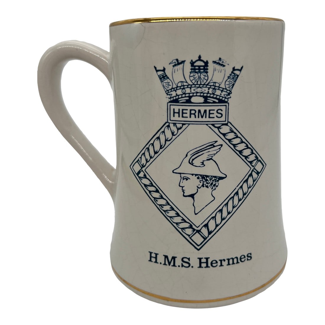 Rare H. M. S. Hermes Tankard: This vintage mug is a must-have for any military collector or navy enthusiast. Gilt accents on a white field with navy blue outlines. Featuring the iconic HMS Hermes design, this tankard or coffee