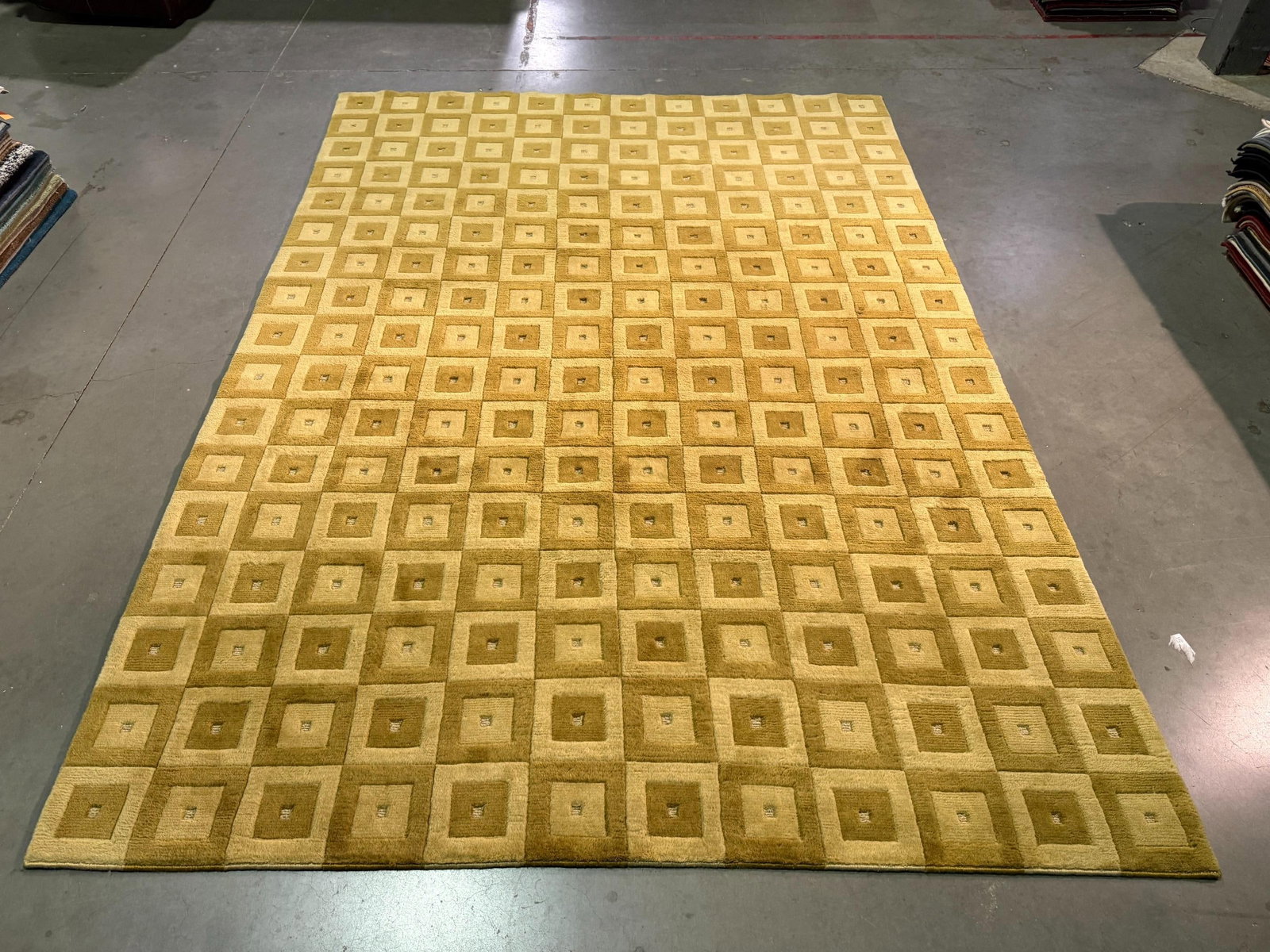 Exquisite Carved Modern Rug 8x11: Title:Exquisite Carved Modern Rug 8x11 Description:8x11 Modern Design Rug Hand woven and hand carved in Gold Color Hand Knotted in India Reserve: $750.00 Shipping: Domestic: Flat-rate of $145.00 to an