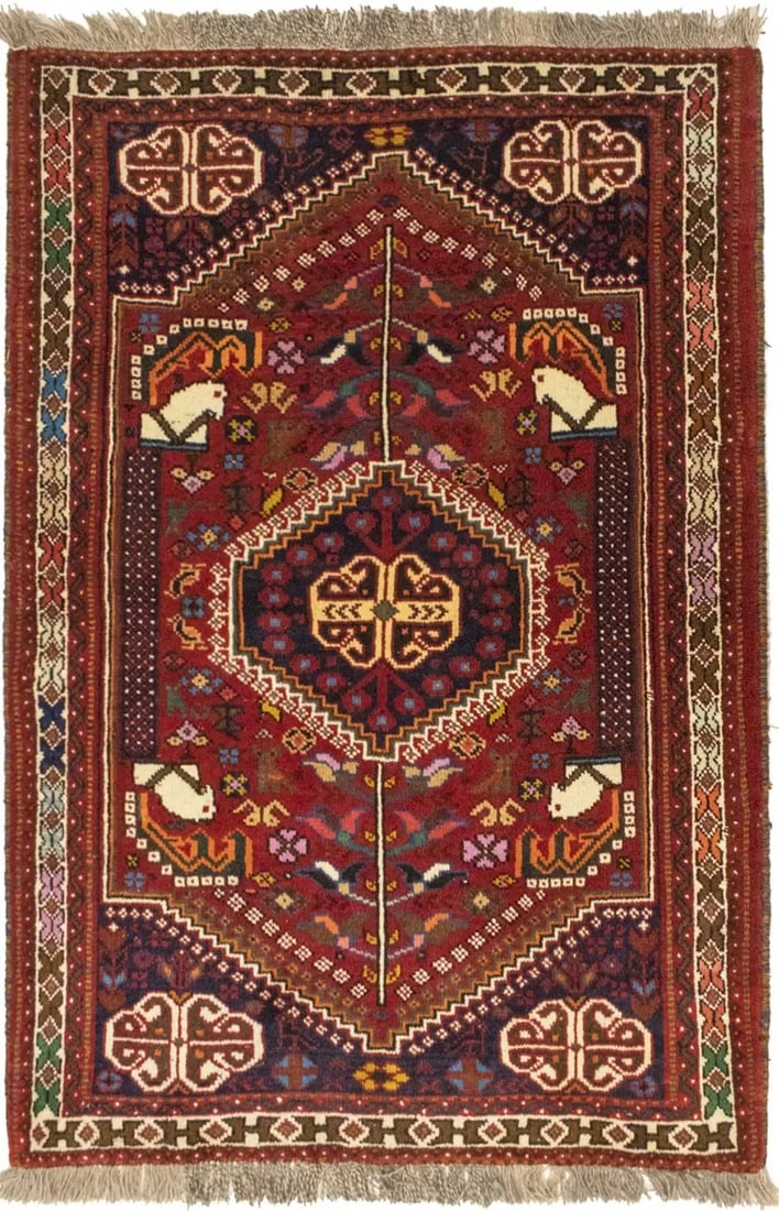 Red Tribal 3'6X5 Shiraz Persian Rug: Title: Red Tribal 3'6X5 Shiraz Persian RugDescription:Hand Knotted 3'6X5 red Persian rug made with vegetable dyes (fine wool pile and cotton foundation), superior knot count, and appealing ancient