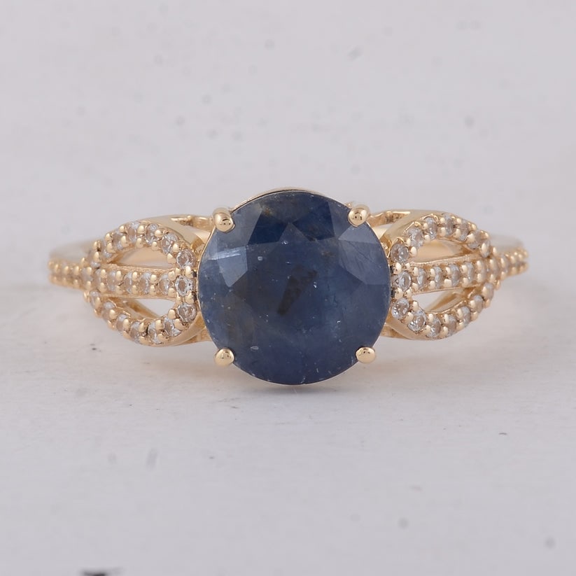 2.92 Ct Round Sapphire 9K Gold Ring: 2.92 Total Carat Sapphire 9K Gold Ring Specifications Total Weight 2.23 g Center Gemstone Sapphire Gemstone Carat Weight 2.7 Carats Gemstone Measurements 8 mm Additional Gemstones White Sapphire Addit