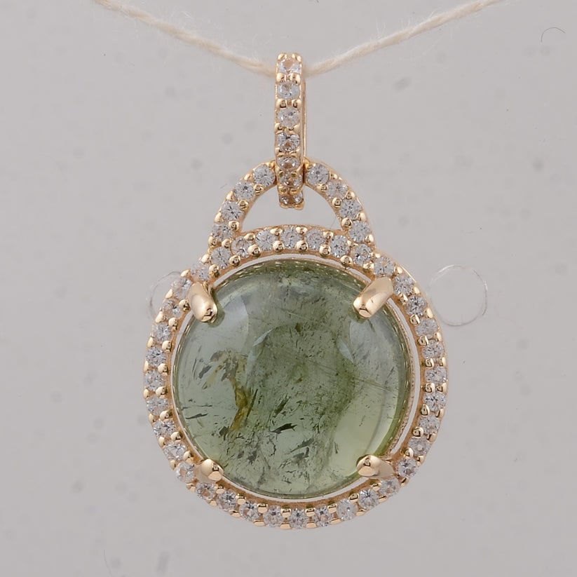 4.22 Ct Round Tourmaline 9K Gold Pendant: 4.22 Total Carat Tourmaline 9K Gold Pendant Specifications Total Weight 1.73 g Center Gemstone Tourmaline Gemstone Carat Weight 4 Carats Gemstone Measurements 10X10X4.90 mm Additional