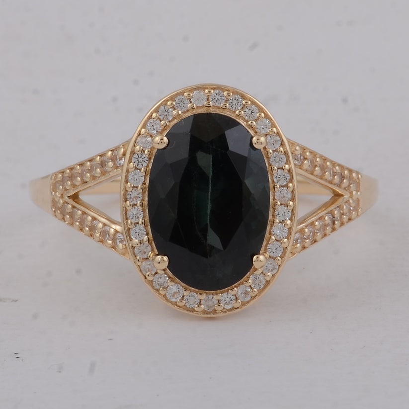 2.49 Ct Oval Tourmaline 9K Gold Ring: 2.49 Total Carat Tourmaline 9K Gold Ring Specifications Total Weight 2.57 g Center Gemstone Tourmaline Gemstone Carat Weight 2.27 Carats Gemstone Measurements 10X7X5 mm Additional Gemstones White Sapp