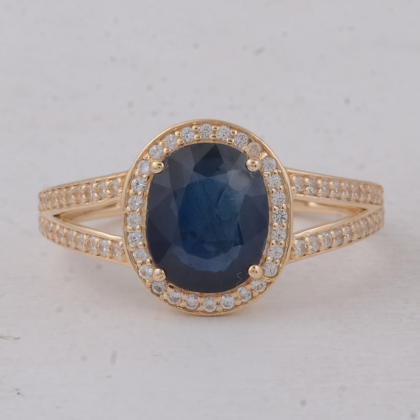 2.38 Ct Cushion Sapphire 9K Gold Ring: 2.38 Total Carat Sapphire 9K Gold Ring Specifications Total Weight 2.529 g Center Gemstone Sapphire Gemstone Carat Weight 2.08 Carats Gemstone Measurements 8.80X7.20X3.40 mm Additional Gemstones White
