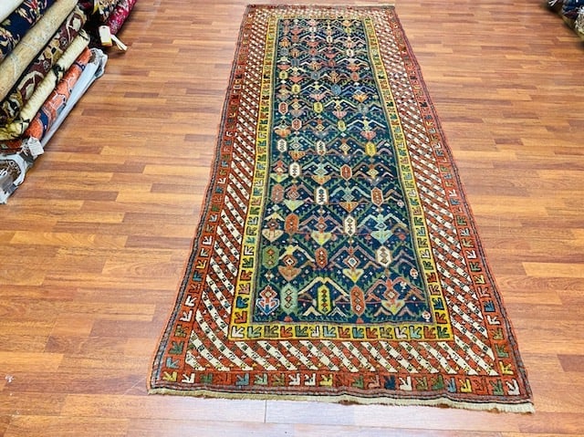 19th Century Gendje Caucasian Rug-3308: Title:19th Century Gendje Caucasian Rug-3308Description:Central Caucasian, size 3 ft. 10 inches by 10 ft. 4 inches, circa late 19th Century, repeating row's o f large insect pattern in green, yellow,