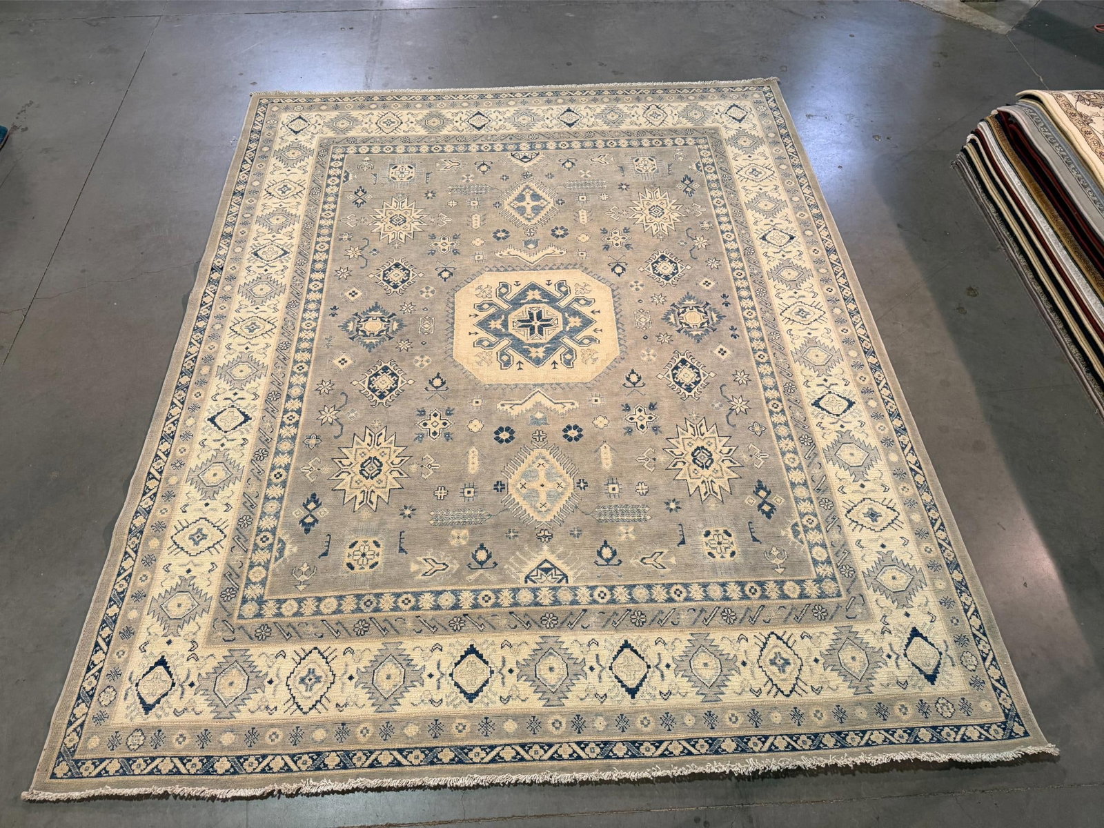 Fine Kazak Rug 8x10: Title:Fine Kazak Rug 8x10Description:8x10 Stunning Super quality design Kazak Rug, hand spun and hand knotted rug in Pakistan 100% Vegge Dye natural wool Pile, Luxurious antique look in tan, grey and