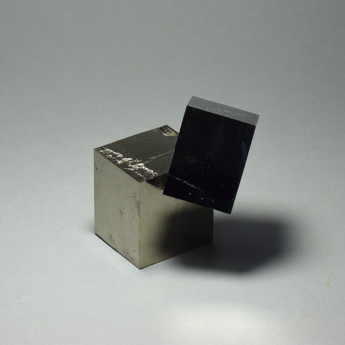 Beautiful Iron pyrite cluster: Title: Beautiful Iron pyrite cluster Origin: Spain Size: 63 x 53 x 53 mm Description: Large and heavy natural iron pyrite cluster. Great luster and shape. Very decorative. Measurements: 63 x 53 x 53 m