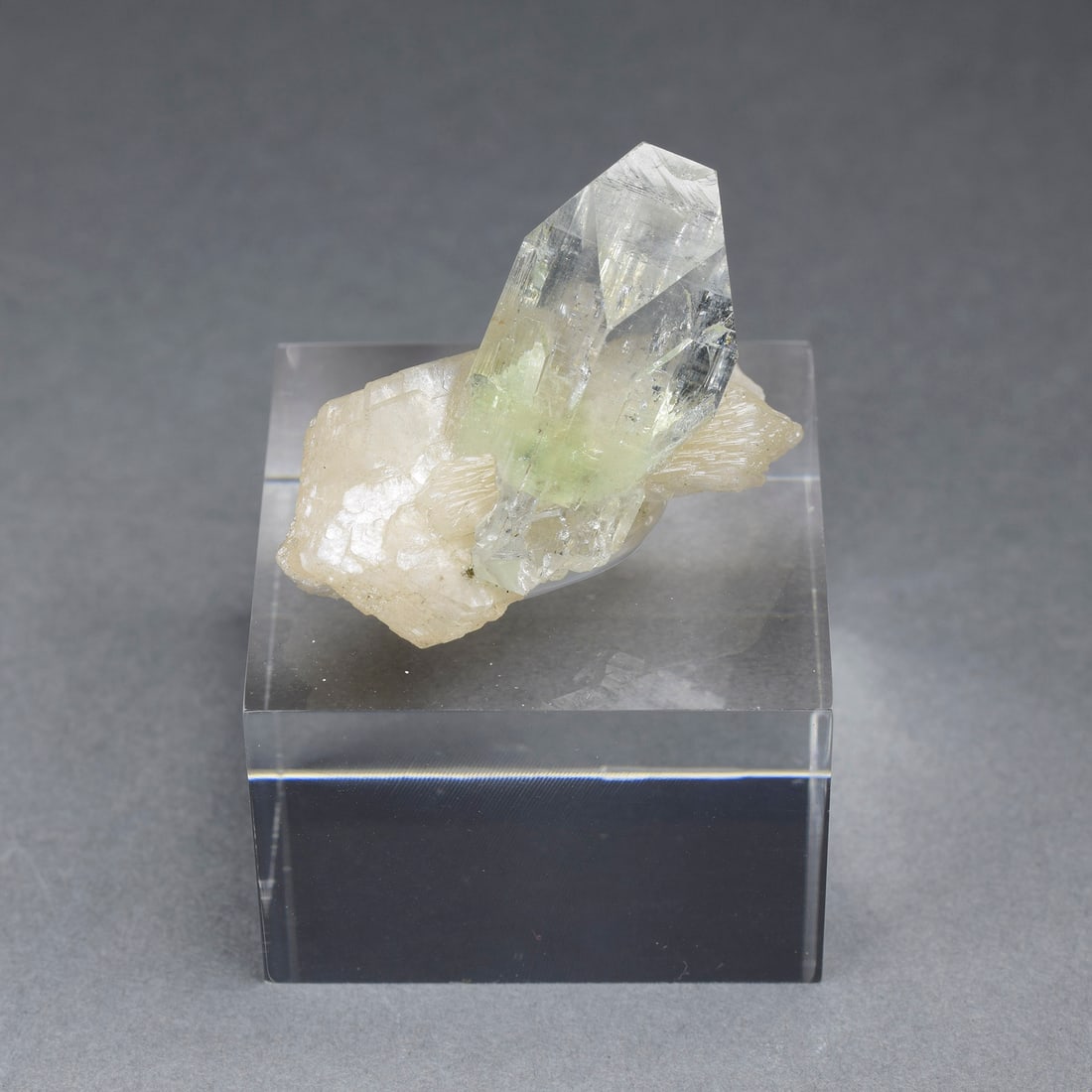 Fine Apophyllite on stilbite: Title: Fine Apophyllite on stilbite Origin: India Size: 3 x 2.3 cm Description: Fine Apophyllite on stilbite. Beautiful color and luster. Measurements: 3 x 2.3 cm Weight: 27 g with stand Reserve: $80.