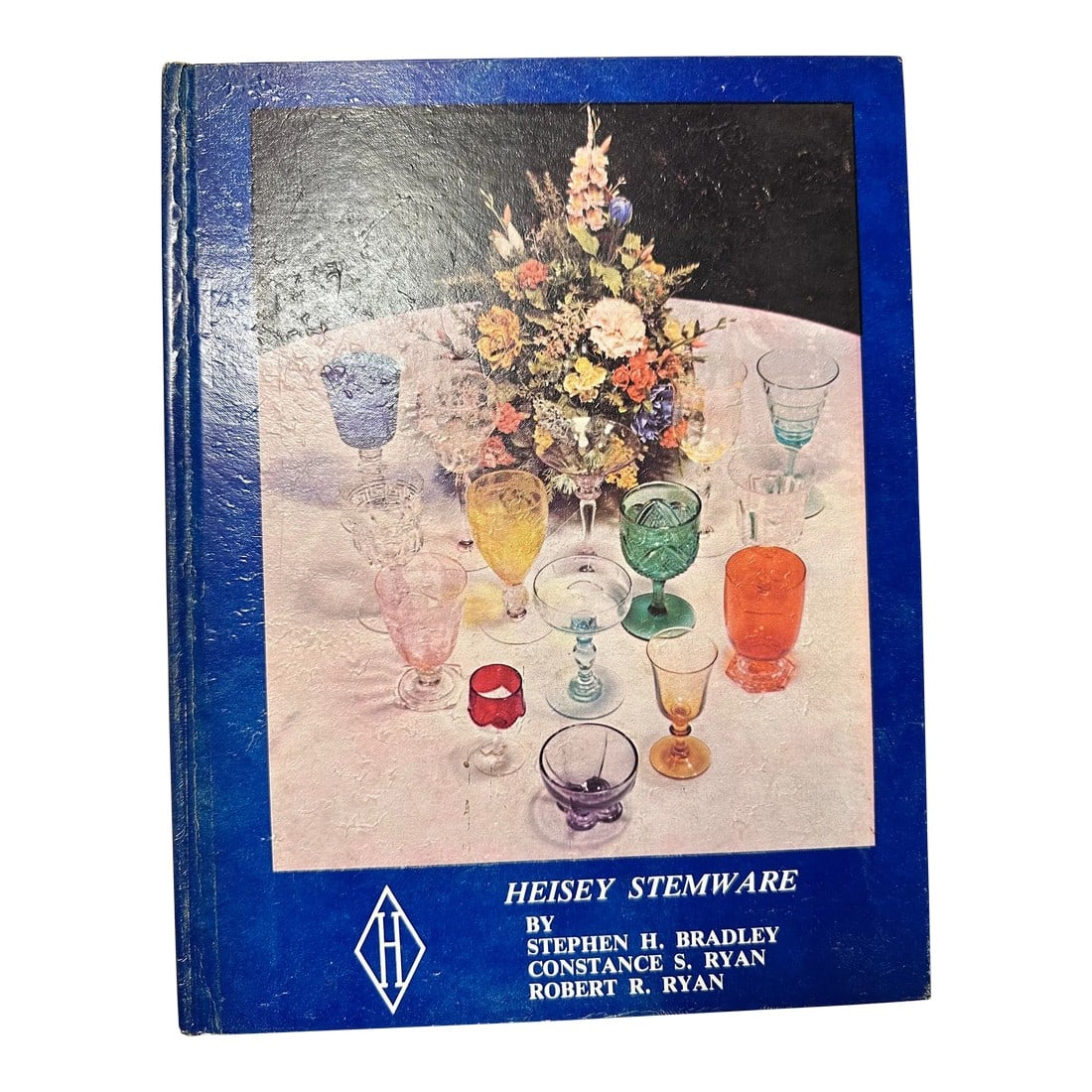 1976 Heisey Stemware Hardcover Book: Explore Heisey collectibles in this vintage Hardcover Book. Published 1976. Great for seasoned collectors and new! Showcase your own collection with this book. While the internet is great there is