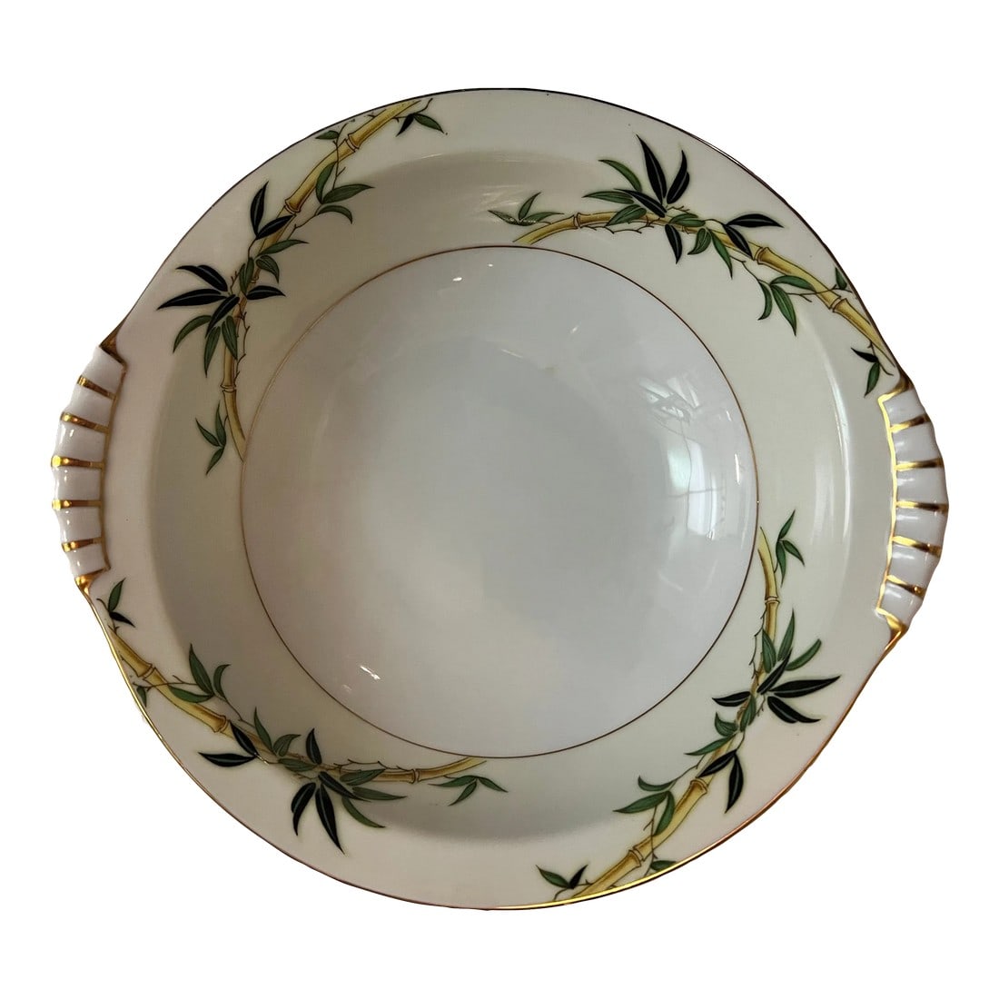 Vintage Mid-Century Kent China "Bali Hi" Pattern Serving Bowl: Welcome to Tirtle and Crane! Introducing the Vintage Mid-Century Kent China "Bali Hi" Pattern Serving Bowl, a stunning piece that exudes the charm and elegance of the mid-century era. This round servi