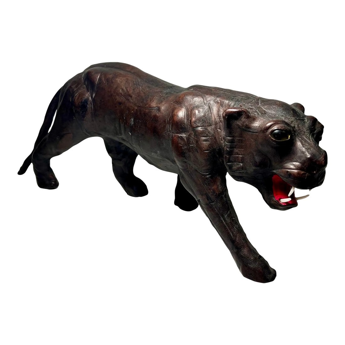 Mid - Century Leather Wrapped Black Panther Figurine: Welcome to Turtle and Crane! Let us present to you the captivating qualities of this Vintage 1960's Midcentury Leather Wrapped Black Panther, despite its unknown maker. 1. Striking and Iconic