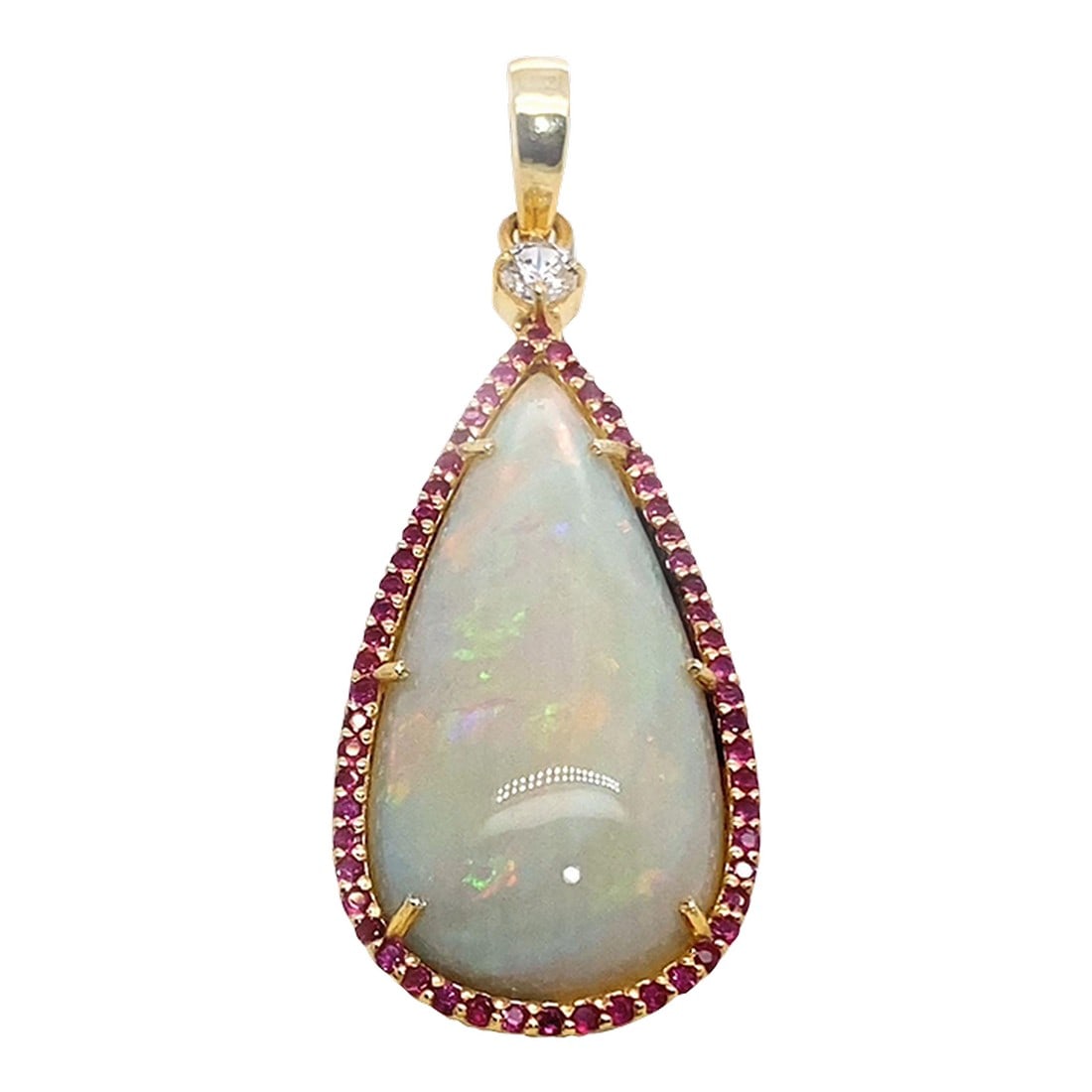 AJD Pendant Teardrop Opal Red & Green Surrounded by Ruby: This is part of Chairish's Fine Jewelry assortment. 16.98ct magnificent Opal with red and green flashes. This fabulous opal is has to most desired red flashes every way you look at it and at 16.95