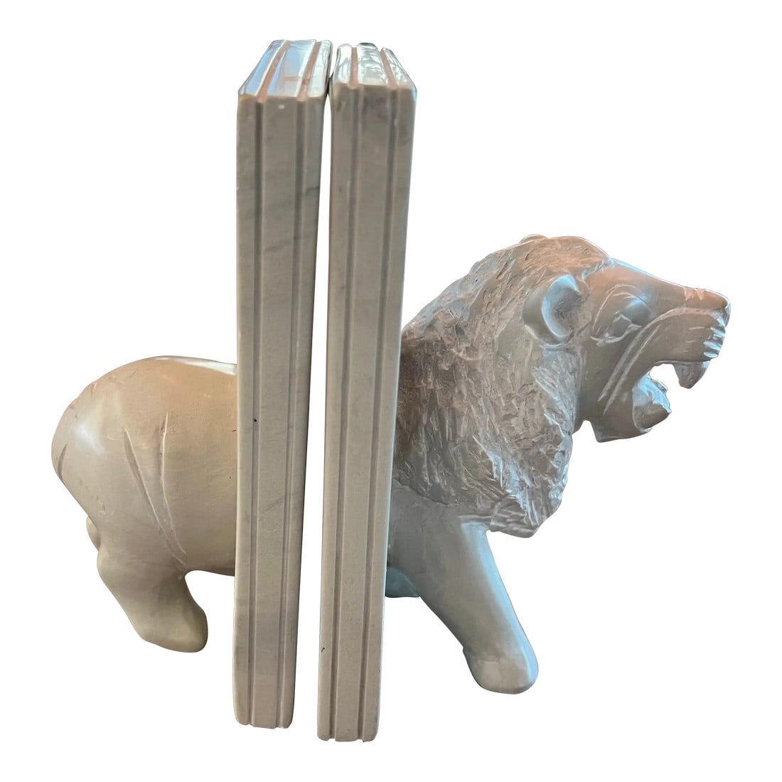Vintage Carved Stone Lion Bookends: Lovely lion bookends that have been carved from a creamy white stone. Very detailed. Condition: Alterations: Original Condition Unaltered Imperfections: Some Imperfections Condition Notes: Nice