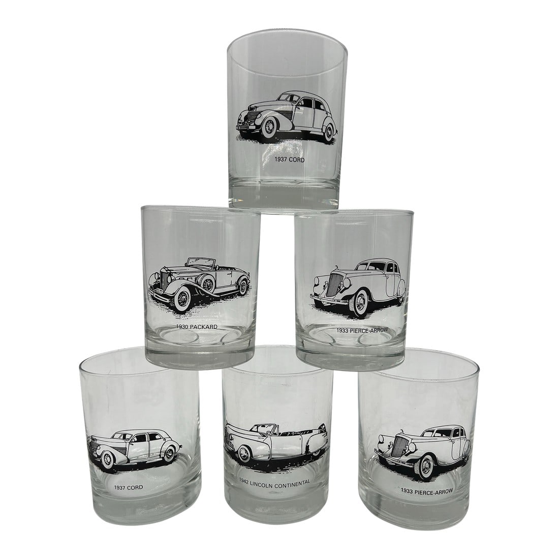 Mid Century Antique Car Glasses Set of 6: Set of six double old fashion glasses. Each glass depicts an antique car. Cars represented: 1930 Packard, 1937 Cord, 1942 Lincoln Continental, 1933 Pierce Arrow Condition: Alterations: Original