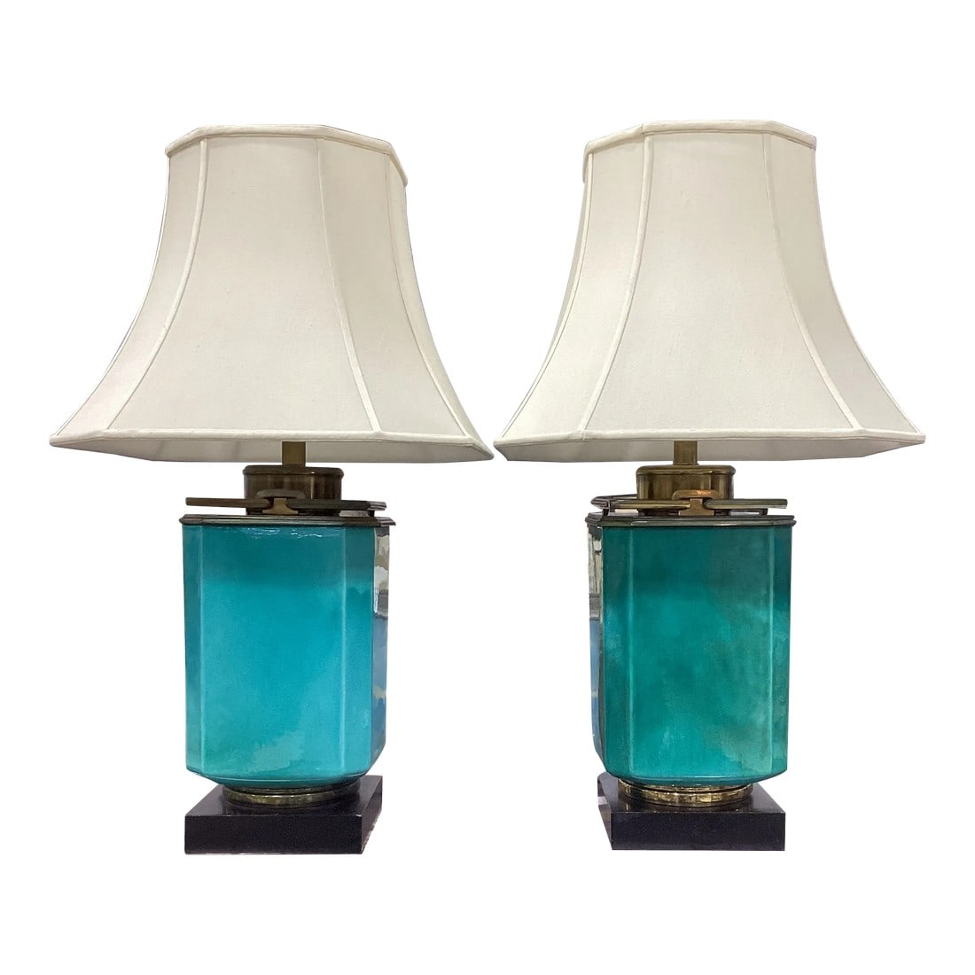 Pair of Edwin Cole for Stiffel Mid-Century Modern Turquiose Lamps With Antique Brass Hardware and Eb: Vintage 1950s glamour, professionally restored for modern use. Designed by Edwin Cole for Stiffel, but unmarked, each features a dynamic turquoise vessel with antique brass hardware and a chunky