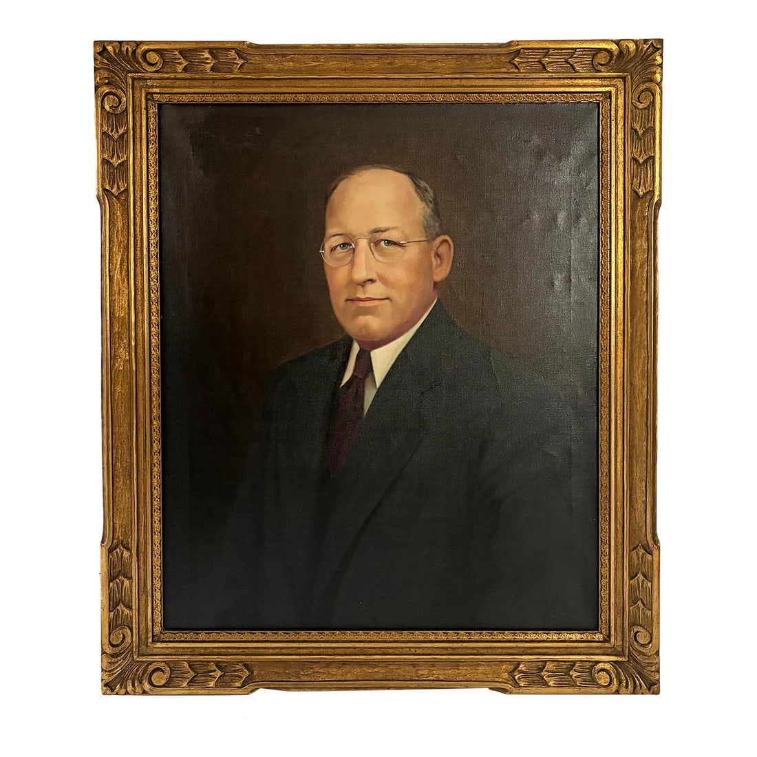 1920s Antique Portrait Oil Painting of a Gentleman, Framed: This stunning antique male portrait painting of a handsome man in a suit is the perfect way to make a statement in your lounge, bar or great room with a gothic or Art Deco style. Signed by artist