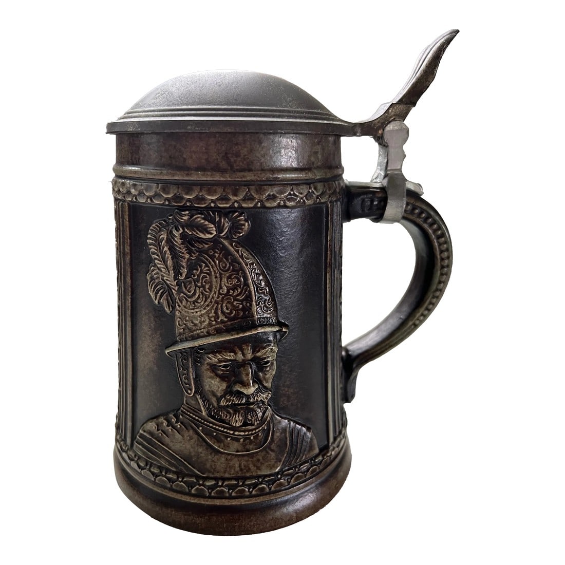 Vintage Gerz West German Beer Stein With Pewter Lid: Beer stein with pewter lid made in West German by Gerz. Soldier depicted on the side with a brown glaze. The inside and bottom of the stein are glazed in a seafoam green. Marked 1862 on the bottom. 