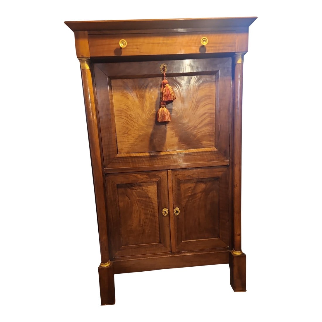 Antique French Empire Secretary Desk: This is one beautiful versatile piece. The French empire style would work in any style interior. The flame mahogany makes it really stand out. But then you open the desk and get a wonderful view of