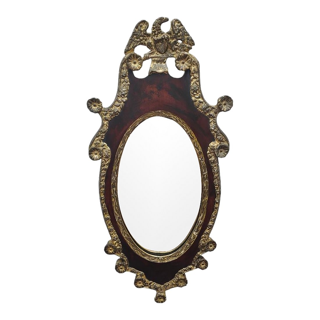 19th Century Carved and Gilt Mahogany Federal Revival Mirror: A richly decorative Federal Revival mirror crafted in the late 19th century, inspired by the patriotic neoclassicism of early America. The frame features a mahogany-stained finish over carved wood, wi