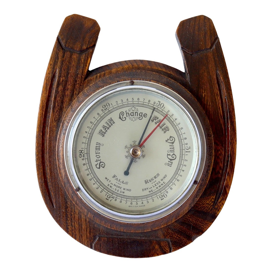 English 'Horseshoe' Wall Mount Barometer: This well-made English oak barometer features a unique horseshoe shape and a classic porcelain face. Designed to hang on the wall, it combines functionality with timeless charm. Perfect for adding a t
