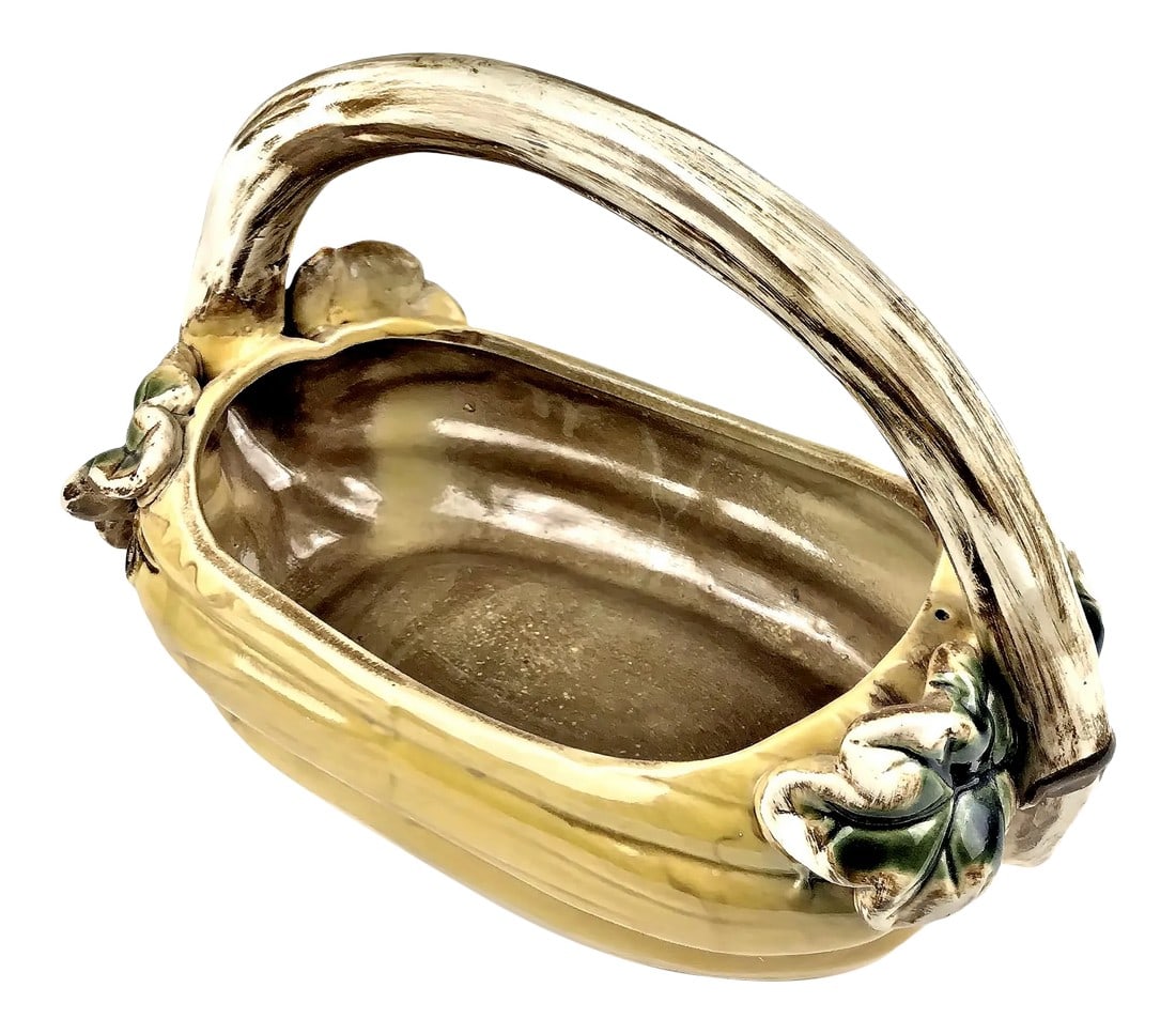 Vintage Studio Rustic Pottery Basket: Unique design and elegant glazing. The colors are neutral to match your casual style. This basket can be a planter, serve popcorn or nuts. How about fruit? It's well potted and heavy. No issues at