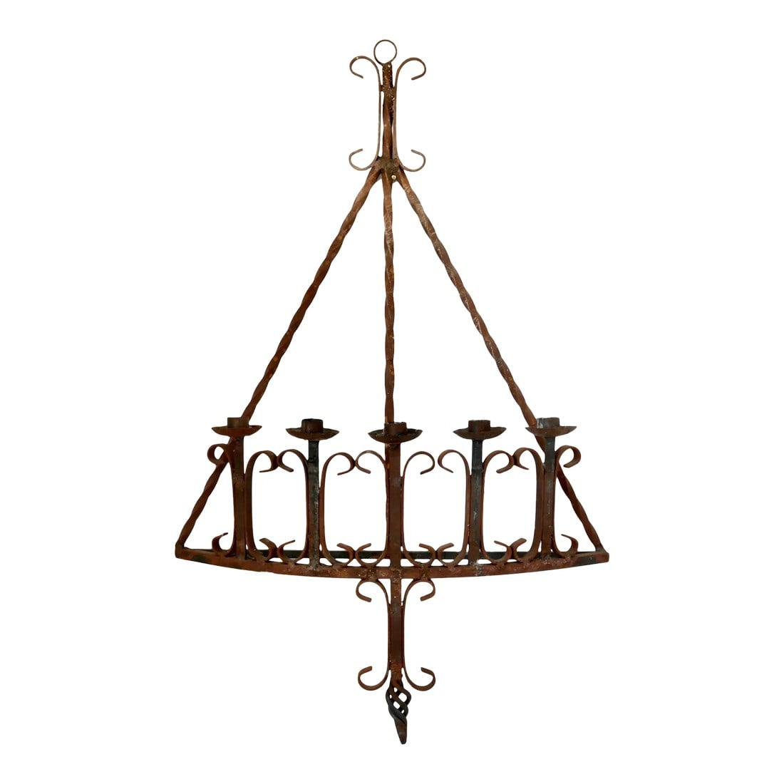 Early 20th Century California Wrought Iron Wall Candelabra: Early 20th-century hand-forged wrought iron wall candelabra, crafted in California in the Mission Revival style. The pyramidal frame holds five taper candles (not included) and features elegant