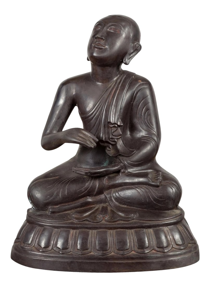 Mid 20th Century Vintage Bronze Lost Wax Sculpture Depicting a Praying Monk Sitting on a Base: A vintage bronze sculpture depicting a praying monk sitting on a base. Created with the traditional technique of the lost-wax (Ã la cire perdue) that allows a great precision and finesse