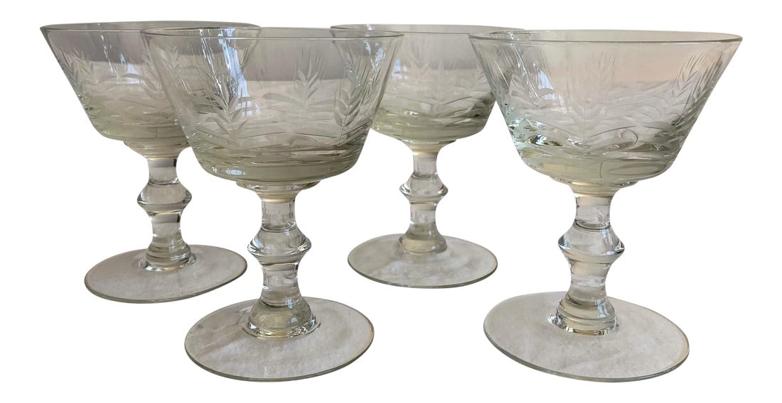 1960s Mid-Century Wheat Etched Glass Champagne Coupes - Set of 4: Imagine the parties these midcentury glasses have attended. Gorgeous set of four vintage etched champagne coupes with a classic vintage wheat design. The stem is incredibly study with a flare in the