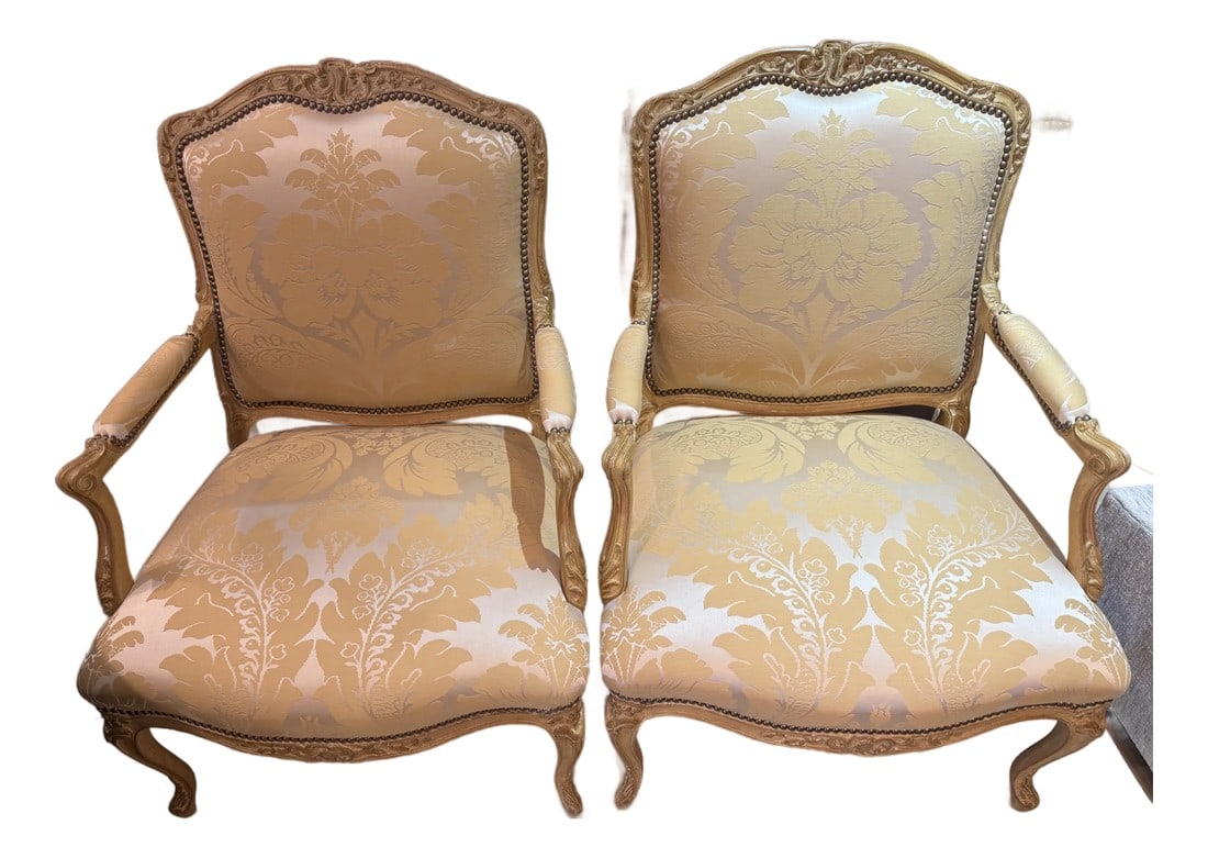 Pair of French Louis XV Style Bergères Attributed to Maison Jansen: Pair of magnificent French Arm Chairs attributed to Maison Jansen. The original finish is the work of a master refinisher, freshly upholstered in Silk Damask with brass nail head. Condition: