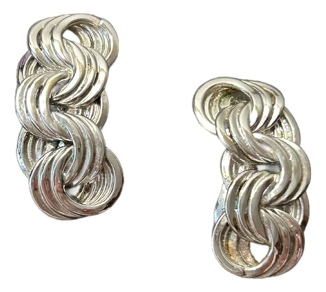 Vintage Monet Silver Tone Scroll Link Clip-on Earrings, A Pair: Vintage Monet Silver Tone Scroll Link Clip-On Earrings – Textured Braid Design, Signed These elegant vintage Monet silver-tone scroll link clip-on earrings feature a timeless braided and