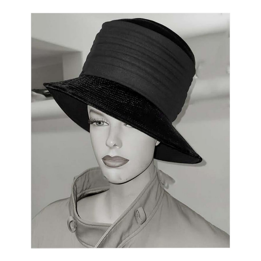 Vintage Ladies Sophistcated Black Hat: Elegant vintage black hat with sophisticated wide brim. "United Hatters Cap & Millinery Wrks" label is attached as shown in photo which will help you date the hat. The brim has a velvet or velveteen