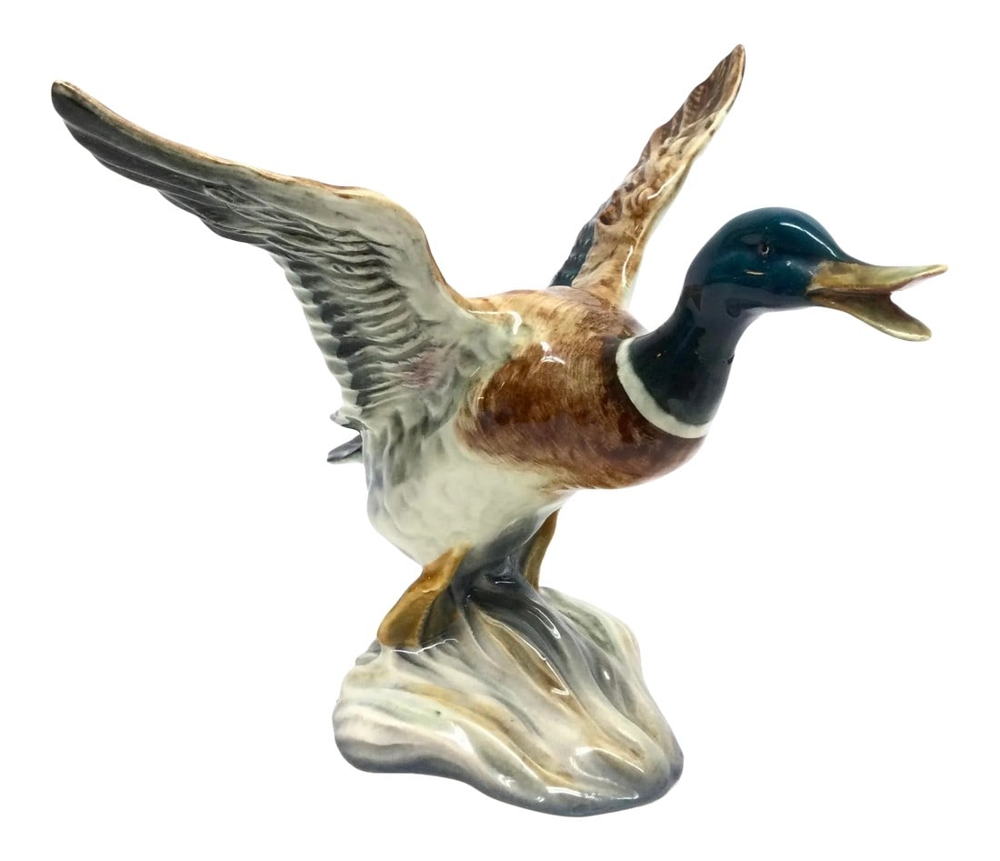 Vintage Beswick Porcelain Mallard Duck England: Realistic Mallard Duck ceramic figurine by Beswick. Made in England in the 1950s or 60s. It is in perfect condition where it counts. The neck has been long ago repaired but hardly shows. I have circle