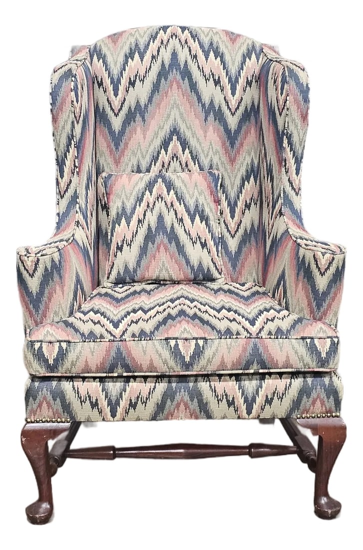 Mahogany Williamsburg Queen Anne Style Wing Back Chair New Flame Stitch Fabric: Store Item: Mahogany Williamsburg Queen Anne Style Wing Back Chair New Flame Stitched Fabric Description: Chairs feature a high back flanked by wings, single seat cushion resting on cabriole legs