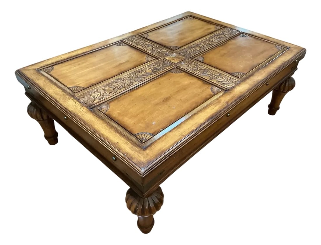 Vintage Indonesian Hand-Carved Wood Coffee Table With Floral Cross Motif: Warm and sculptural, this vintage Indonesian coffee table features a raised cross design with intricate hand-carved floral and leaf motifs. The four recessed panels are framed with carved shell