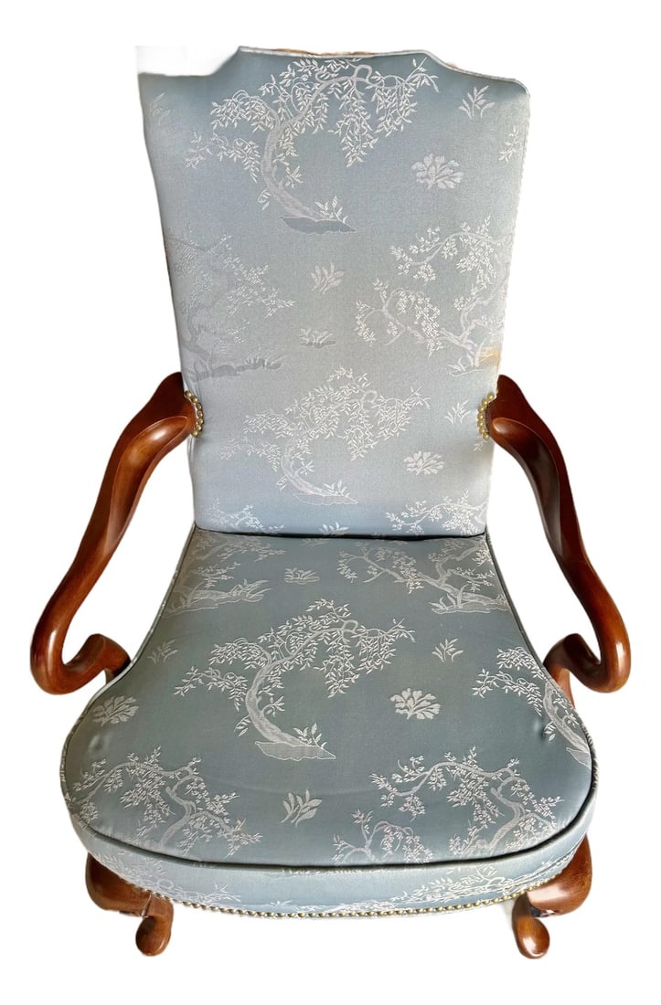 Mid 20th Century Louis XV Style Chinoiserie Accent Chair: The design of the Louis XV style chair suggests it is intended as a decorative accent piece, offering both comfort and elegance to any room. The chair beautifully combines the soft, patterned fabric