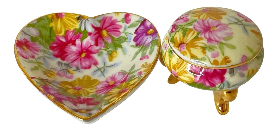 Vintage 1970s NikoNiko Japanese Gilded Floral Hand-Painted Pillbox & Heart Ring Holder - 2 Pieces: Bring instant grandma chic to your guest room with this vintage 1970s pair of hand painted floral ceramic pieces. The petite heart is the perfect size to add a ring or two on the bedstand, while the