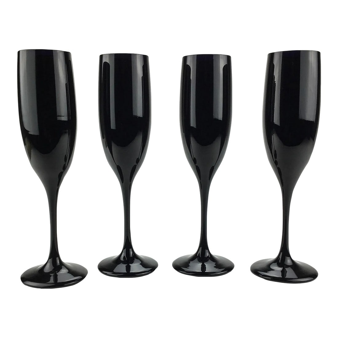 Black Hand Blown Champagne Flutes Circa 1960 - Set of 4: These perfect glasses are absolutely gorgeous with the weight just right for toasting in the new year. Looking into the light, the true color is a deep blue, but these appear black when holding under
