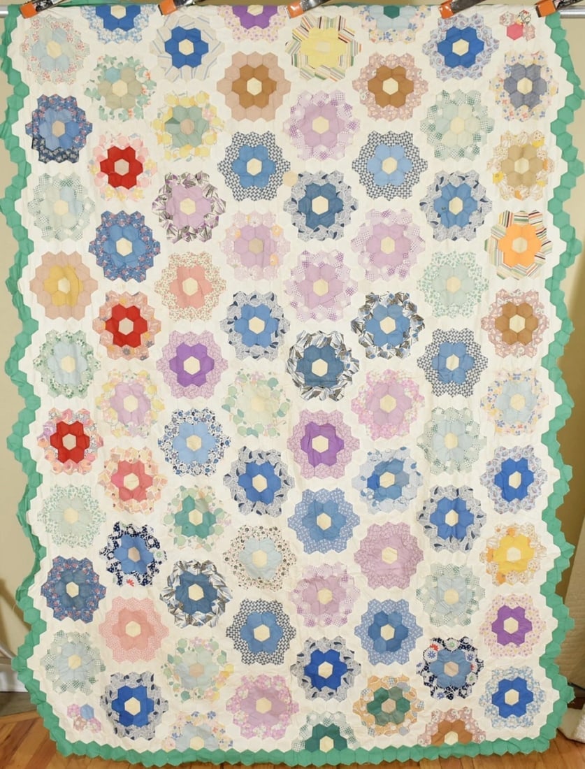 30's Flower Garden Quilt Top: This wonderful cotton 1930's flower garden quilt top is all hand pieced, with hexagon pieces measuring 1" per side. It measures 64" X 82" and is in mint, unwashed condition, with a couple of small,
