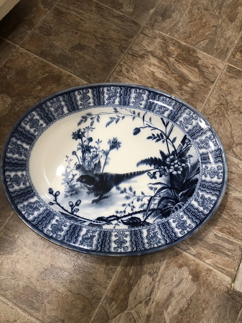 English Flow Blue Game Bird Platter: It measures 17 1/4” x 14” and is marked. I believe it is english, made of ironstone china and dates around the 1870’s. It has no chips, cracks or repairs. I think it could be couldon