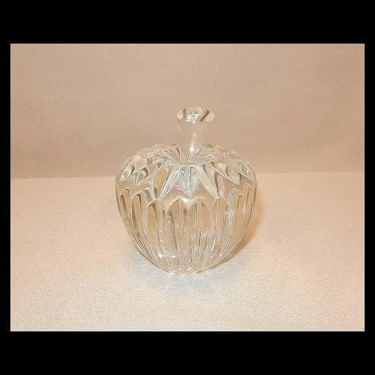 Vintage Waterford Ribbed Apple Stem Paperweight: This is a vintage Waterford crystal paperweight in the shape of a ribbed apple with a stem. It is made of high-quality crystal and reflects light beautifully. It is marked with the Waterford