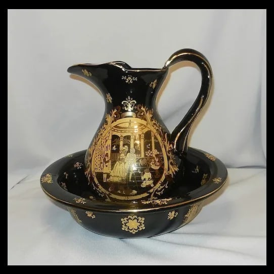 Victorian Limoges Style Hand Painted Black Portrait Plate: A stunning Victorian Limoges Style Hand Painted Portrait Plate. It features a central portrait of an elegant lady against a deep black background, adorned with intricate gold-leaf scrolls and floral a