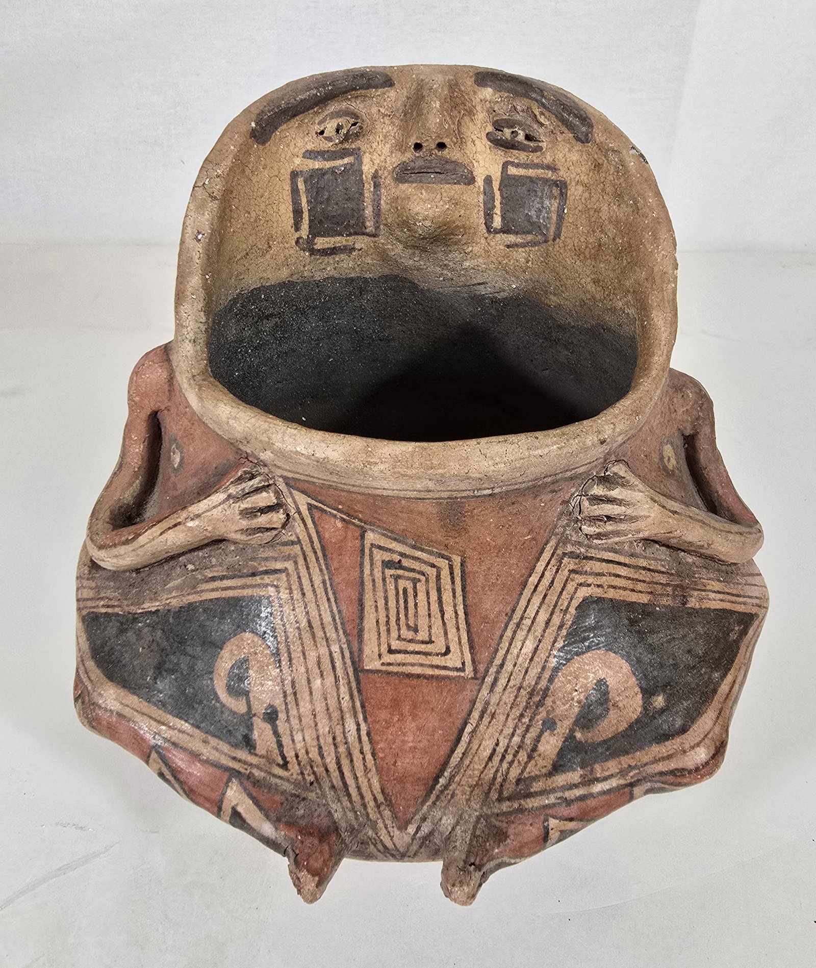 Casas Grandes pottery jar: Title: Casas Grandes pottery jar Dimension: 6.75 x 6.75 x 6.75 Description: Pre-Colombian Casas Grandes human effigy jar wiith great detail ca 1100-1400 AD. Full human form with detailed facial featur