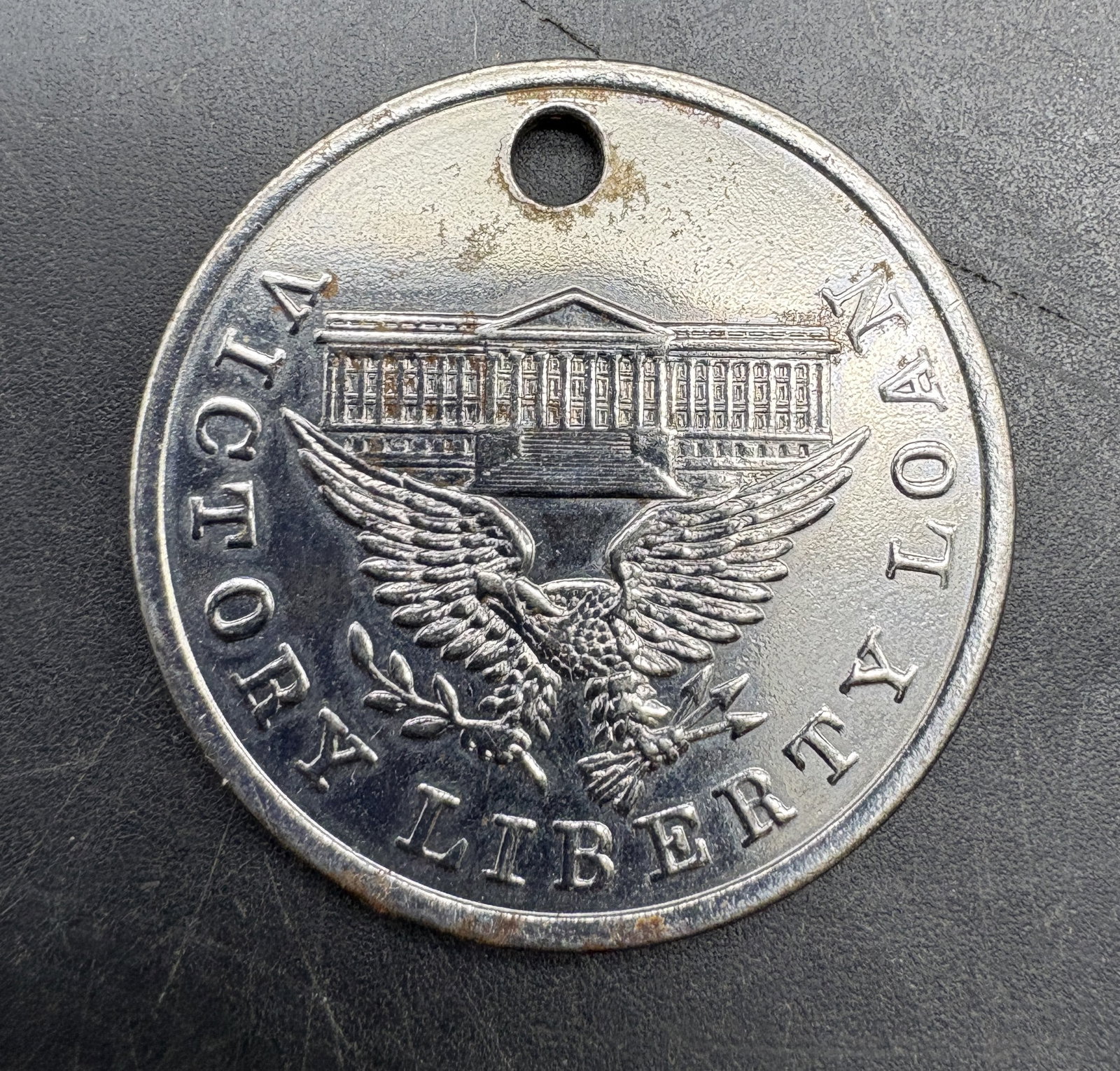 VINTAGE WWII VICTORY LIBERTY LOAN COINS MADE FROM GERMAN CANNON PENDANT: Date/Period: unknownDimension: --Material: unknownAdditional Information: VINTAGE WWII VICTORY LIBERTY LOAN COINS MADE FROM GERMAN CANNON PENDANT Shipping:Domestic: Flat-rate of $6.00 to anywhere
