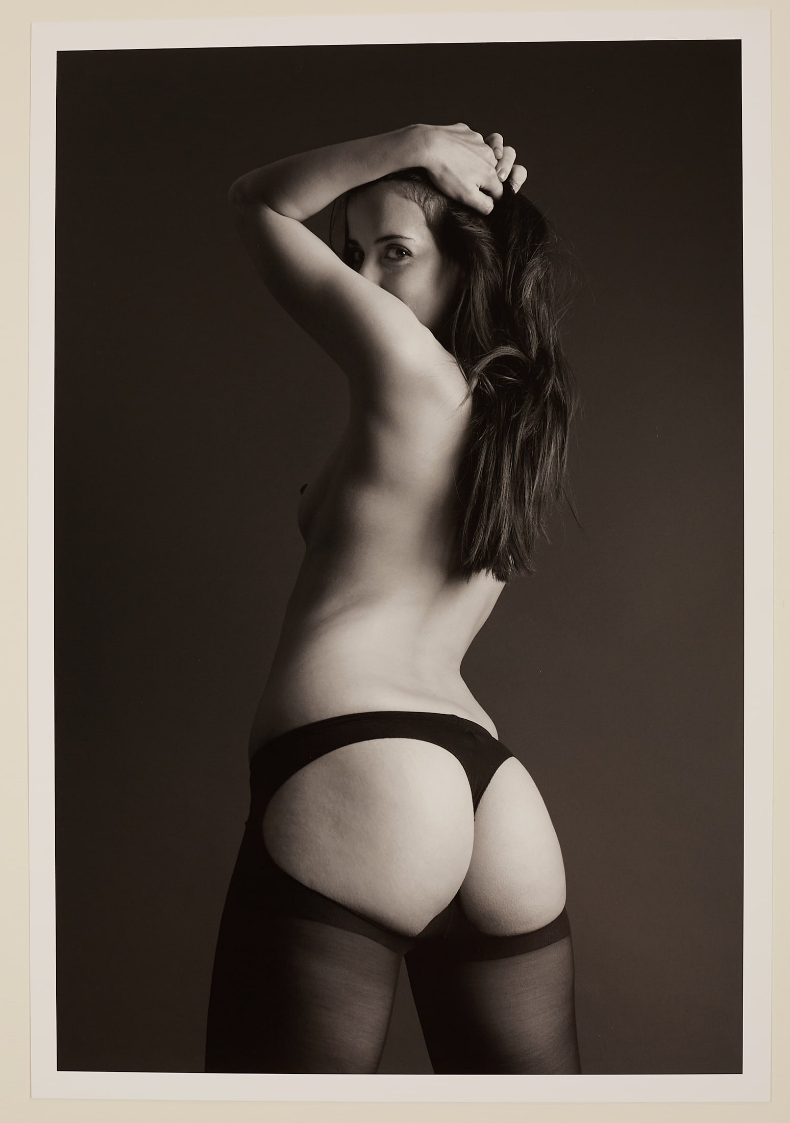 Cheeky 3/25: Artist: Spiros PolitisTitle:Cheeky 3/25Date/Period:2009Materials:photographySize:19" x13"Description:"Cheeky"(2009)JoLouise in figure study in the studio. Edition 4/25. Printed on heavy Canson Baryta