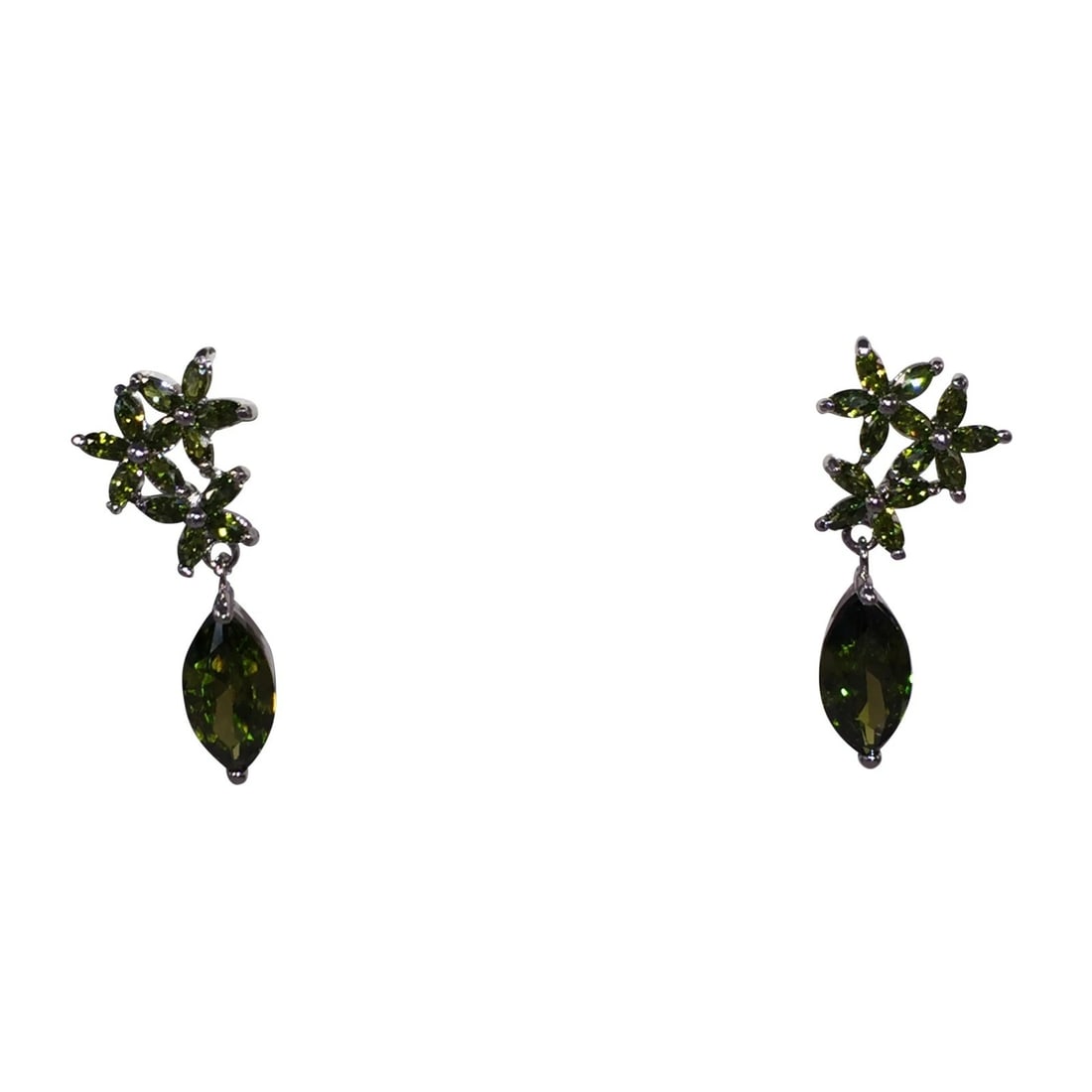 Green Faceted Crystal Earrings with White Chrome Plating: Title:Green Faceted Crystal Earrings with White Chrome Plating Description:Green Faceted Crystal Earrings with White Chrome Plating. Earrings measure 1 1/2" long by 1/2" wide. Earrings are for pierced