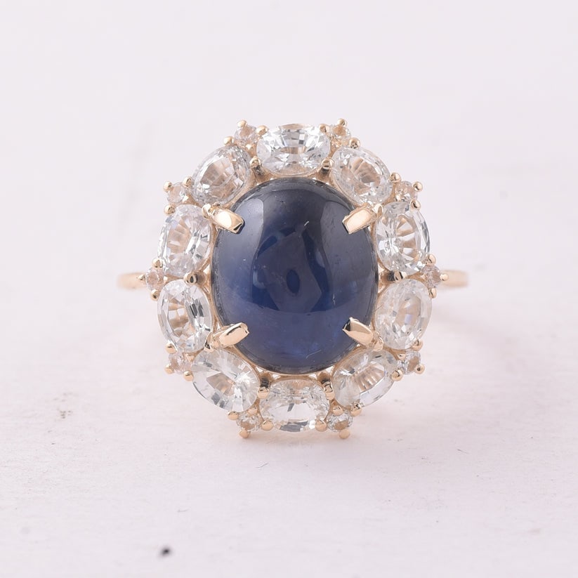 9.68 Ct Oval Sapphire 9K Gold Ring: 9.68 Total Carat Sapphire 9K Gold Ring Specifications: Total Weight 4.028 g Center Gemstone Sapphire Gemstone Carat Weight 6.95 Carats Gemstone Measurements 11.10X9.50X6 mm Additional Gemstones White