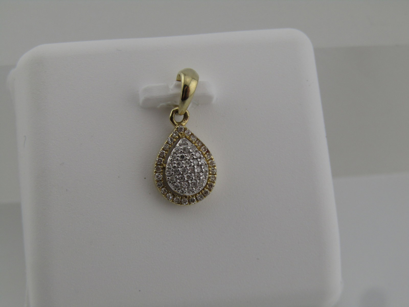 10kt Natural Diamond Pear Shaped Pendant, 1/8 CTW (1 of 4)