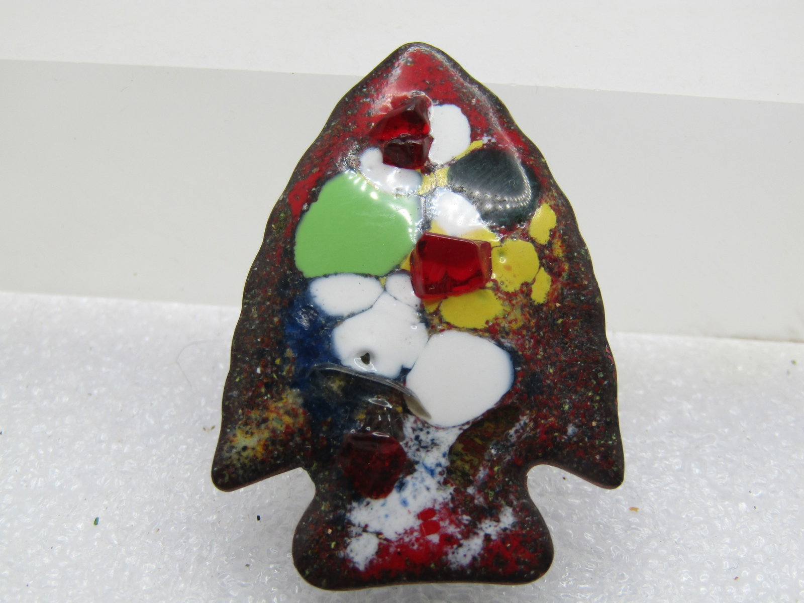 Vintage Enameled Arrowhead Brooch, Copper, Hand Made, 1960's: Vintage Enameled Arrowhead Brooch, Copper, Hand Made, 1960's/. This is appx. 1.75" long and 1-1/8" wide. Themed on Native American's and those before use use of hand made tools. Enameled in red