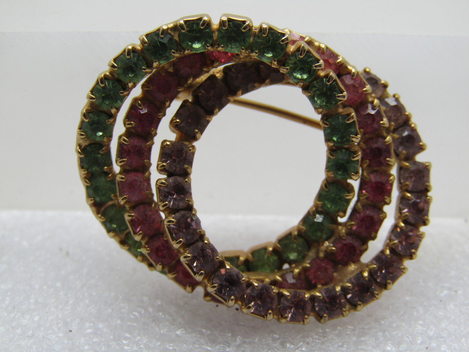 Vintage Triple Rhinestone Circle Brooch, Pink, Lavender, Green, 1960's: Vintage Triple Rhinestone Circle Brooch, Pink, Lavender, Green, 1960's. Round appx. 2.5mm lavender, pink, and pastel green rhinestones, prong-set in a closed back square setting. The stones are round.